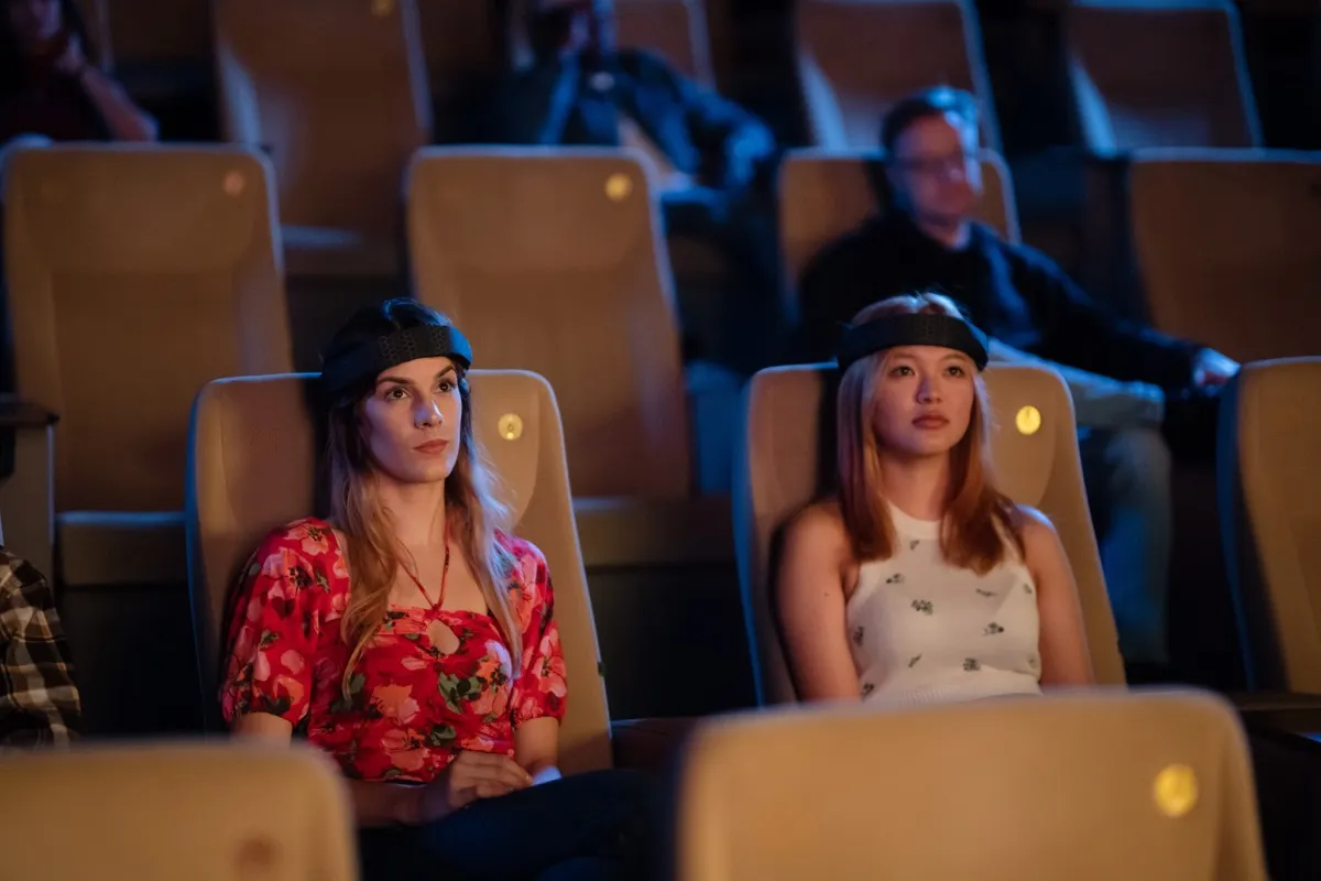 Person wearing Cogwear EEG headband in a relaxed, naturalistic setting